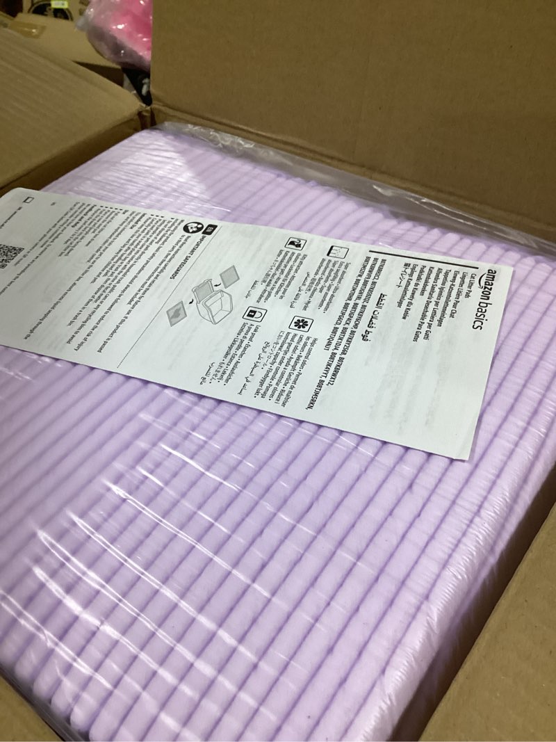 Condition photo showing Good Condition for Amazon Basics Cat Pee Pads, 80 Count, Universal Fit for Litter Box, Odor Control, Unscented, White/Purple