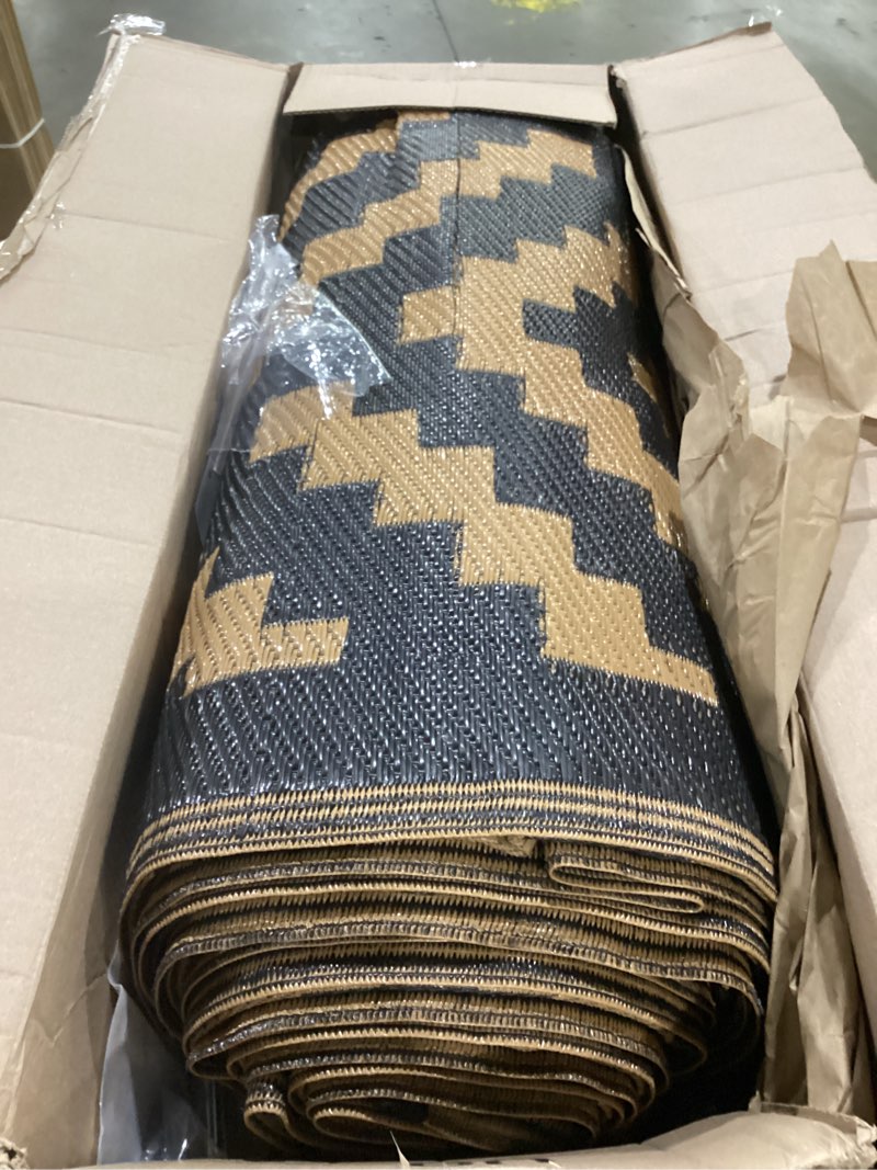 Condition photo showing As Is for genimo outdoor rug for patio clearance, 10'x14' waterproof large camping mat, reversible plastic straw rugs for rv, camper, balcony, backyard, picnic, deck (black & brown) black&brown 10' x 14' (rectangular)