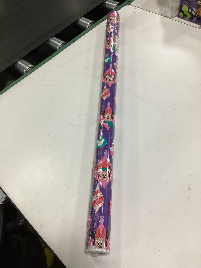 Condition photo showing New/Like New for American Greetings Disney Christmas Wrapping Paper Rolls with Minnie Mouse, Pink and Purple Holiday Gift Wrap (40 sq. ft., 1 Reversible Roll-30 in. x 16 ft.) Minnie, Mickey, Snowmen, Ornaments Minnie Mouse and Friends