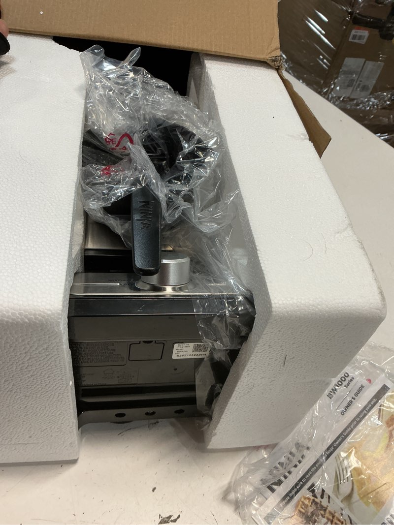 Condition photo showing Good Condition for Ninja BW1001 NeverStick PRO Belgian Waffle Maker, Vertical Design, 5 Shade Settings, with Precision-Pour Cup & Chef-curated Recipe Guide, Black & Silver