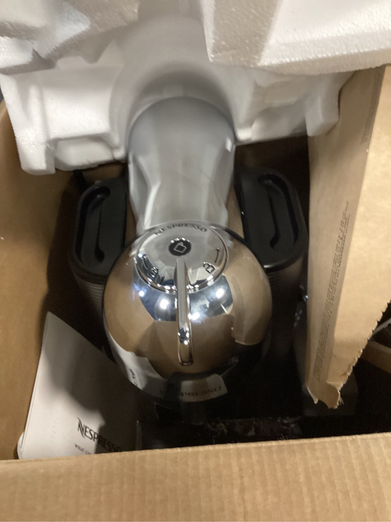 Condition photo showing As Is for Nespresso Vertuo Coffee and Espresso Maker by Breville, Chrome with Aeroccino Milk Frother Machine + Milk Frother Chrome