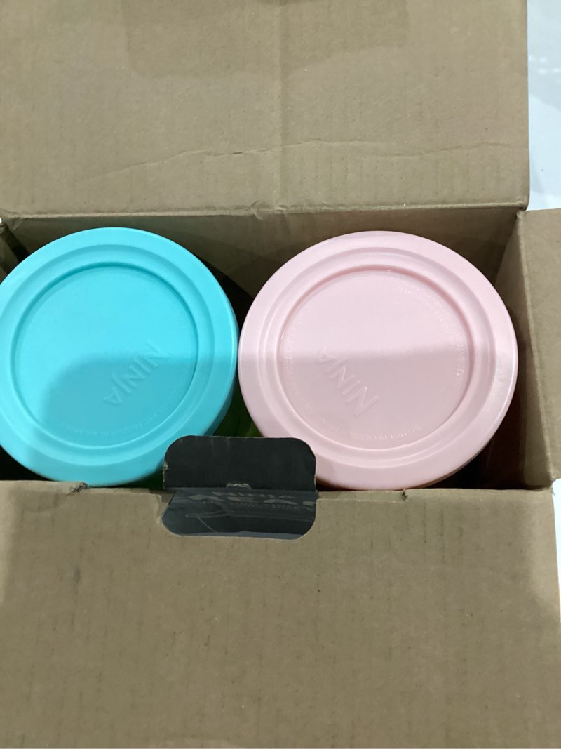 Condition photo showing As Is for ninja creami original pints 4 pack, compatible with nc299amz and nc300s series ice cream makers, bpa-free and dishwasher safe, clear, grey, lime, pink, aqua, xskpld4bcd | original ninja® creami® 4 pack pints with storage lids in aqua, lime, pink, and gray.compatible with nc300 and nc350 series. creami nc2/nc3 pints - 4 pack