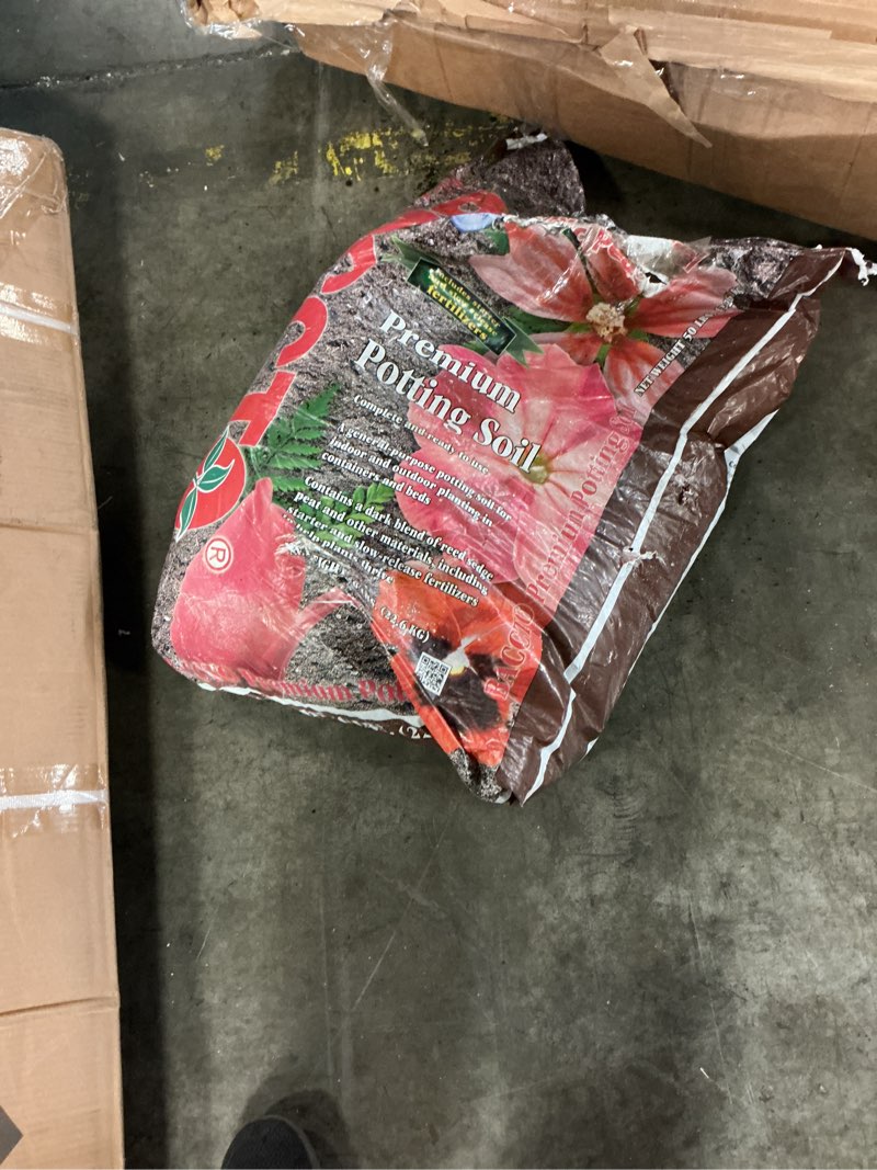 Condition photo showing As Is for michigan peat all purpose premium potting soil w perlite fertilizer  50 lb
