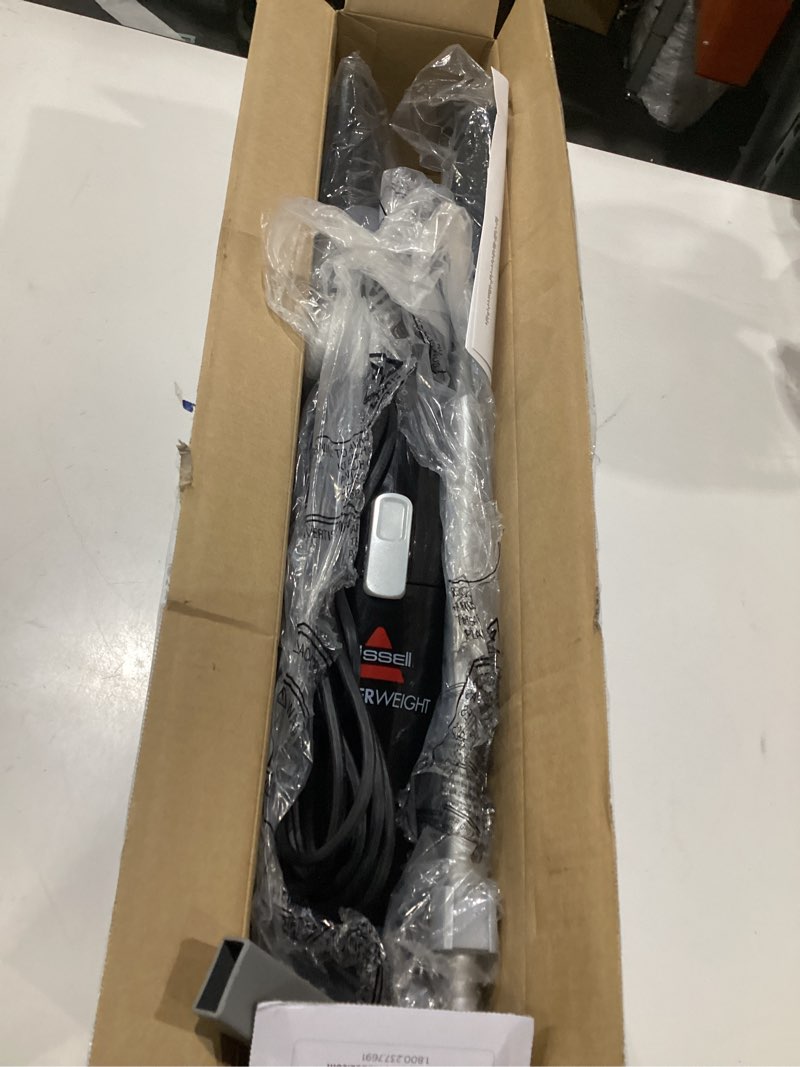 Condition photo showing As Is for bissell 2033m featherweight stick lightweight bagless vacuum and electric broom with crevice tool for hard floors and carpets, black, not tested