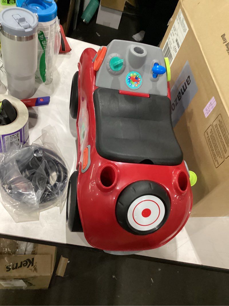 Condition photo showing Good Condition for radio flyer busy buggy, for toddlers 1-3, 3-in-1 push walker ride on car with 17 sensory activities, anti-tip feature, under-seat storage, horn and gears, 42 lb capacity, toddler ride on toys red