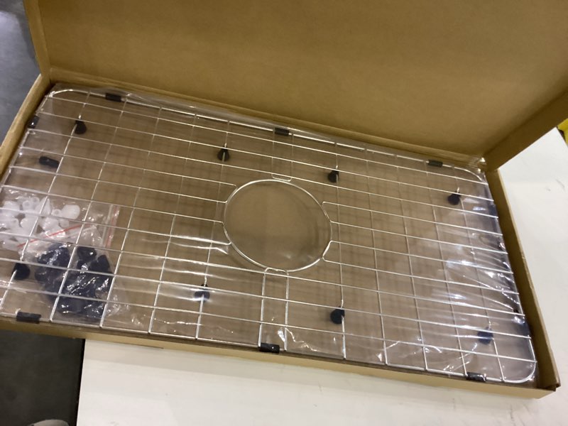 Condition photo showing New/Like New for Serene Valley Sink Bottom Grid 24-1/8" x 12-5/8", Centered Drain with Corner Radius 1-1/2", Sink Protector NLW2412C