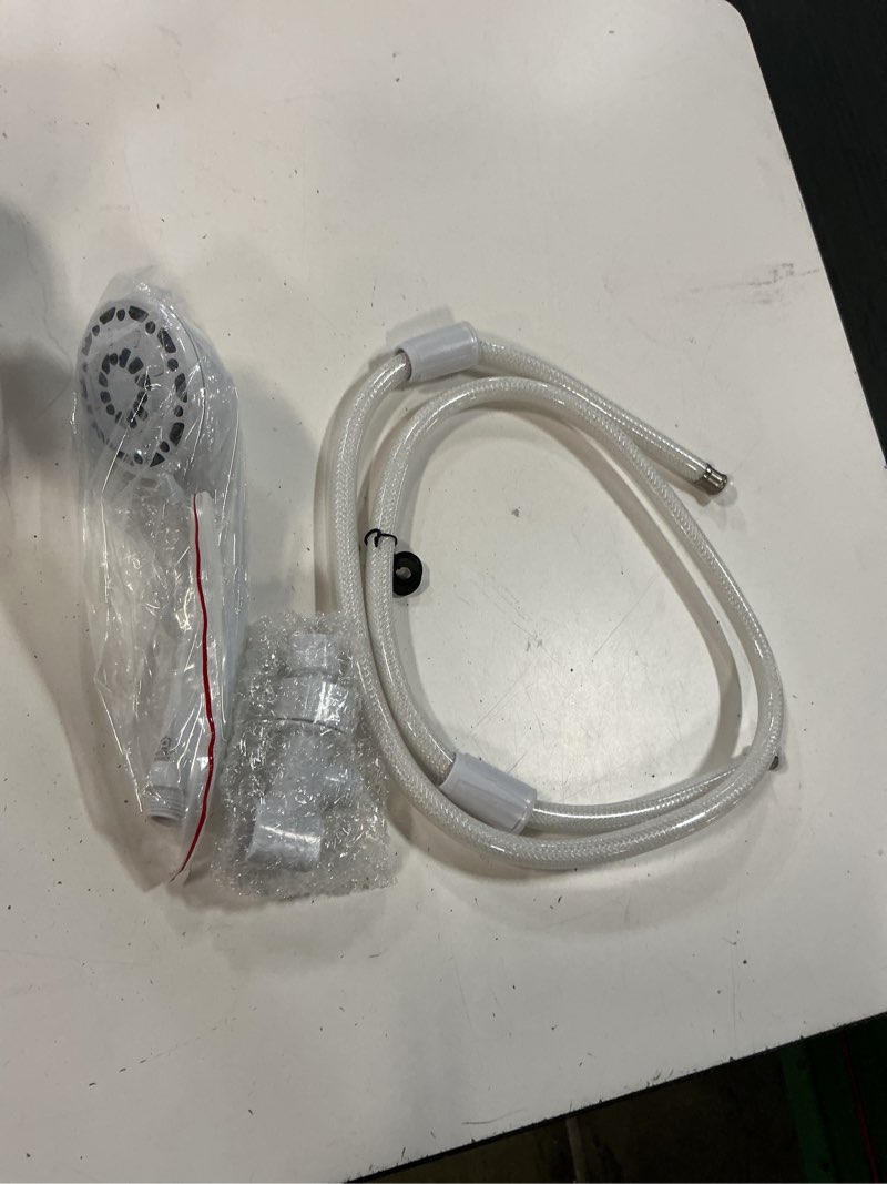Condition photo showing As Is for project source 3.0 -spray white 2-in round handheld shower head 1.8 gpm