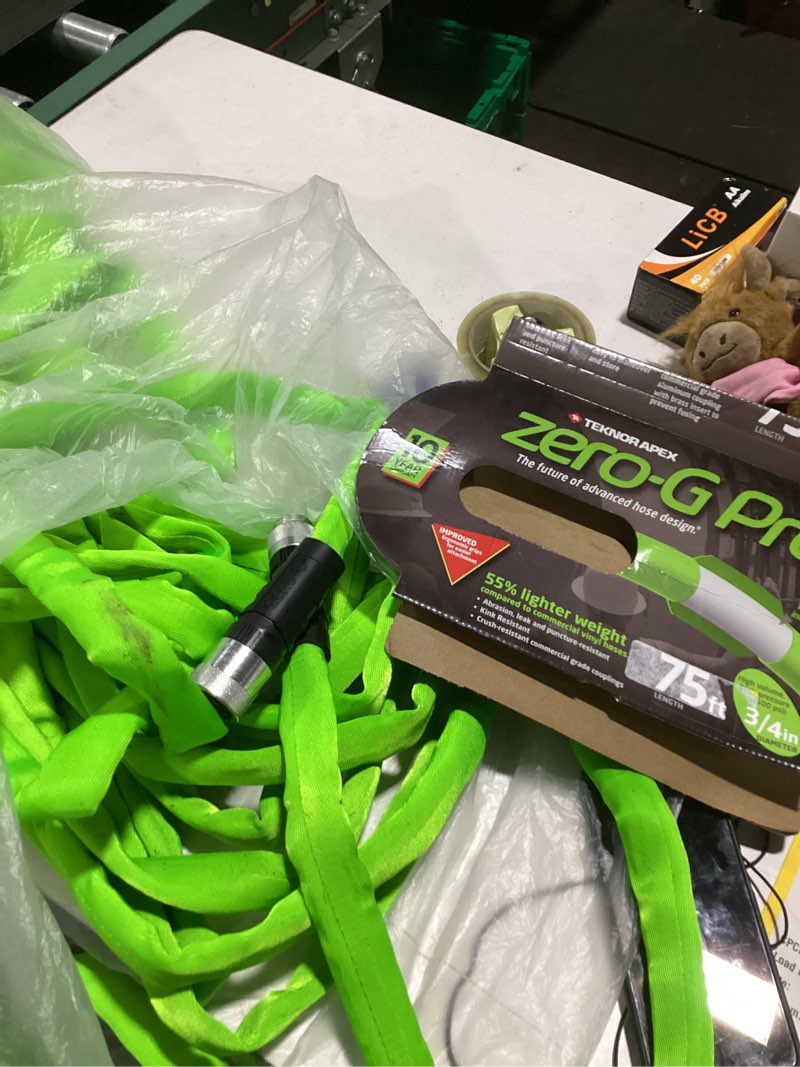 Condition photo showing As Is for zero-g pro teknor apex 3/4-in x 75-ft contractor-duty kink free woven green coiled hose