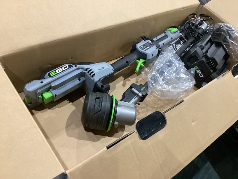 Condition photo showing As Is for ego power+ line iq with powerload st1623t 16 in. 56 v battery string trimmer kit (battery & charger) w/ telescopic shaft & 4.0 ah battery