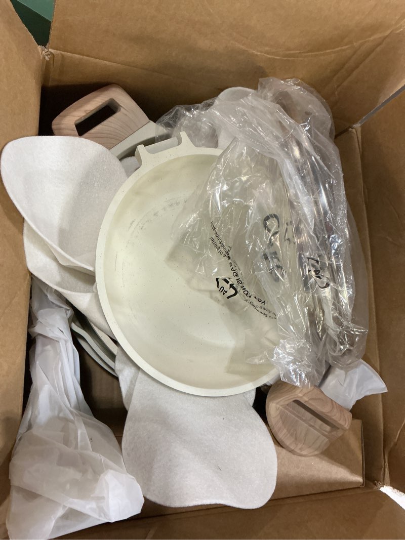 Condition photo showing As Is for CAROTE 14 Pcs Pots and Pans Set Nonstick,Cookware Set Kitchen Cooking Set with Utensil and Pan Protectors Cream White 14 Piece