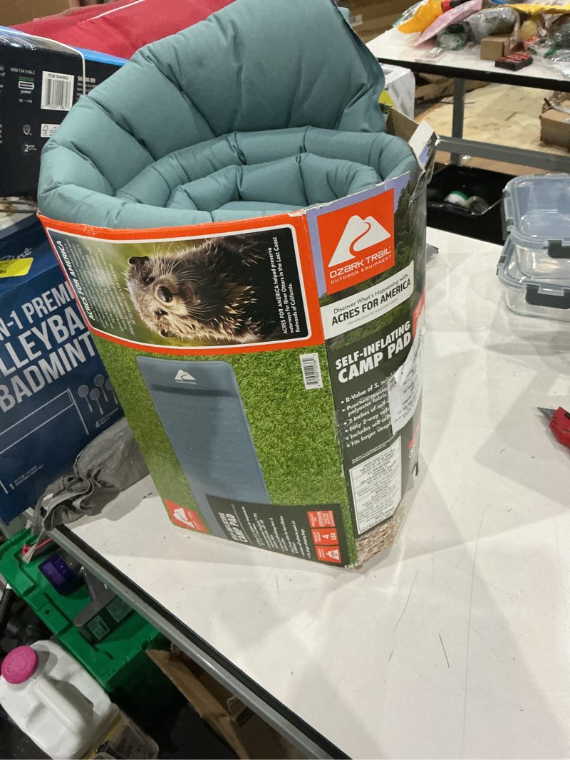 Condition photo showing As Is for ozark trail self-inflating large rectangular sleeping pad