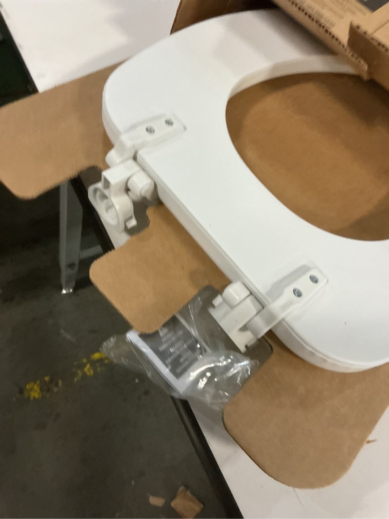 Condition photo showing Good Condition for Mayfair Padded Toilet Seat, Cushioned Soft Vinyl over Wood Core Seat, Secure Hinges, Easy Clean, Made in USA, Elongated, White Elongated White Toilet Seat