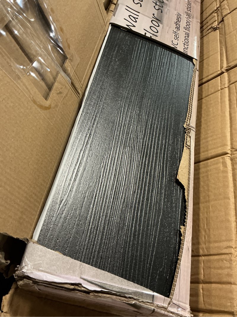 Condition photo showing As Is for 36-pack 54 sq.ft peel and stick floor tiles,black vinyl flooring wood plank,self-adhesive waterproof for bedroom, kitchen, living room home decor 36in×6in black wood 36