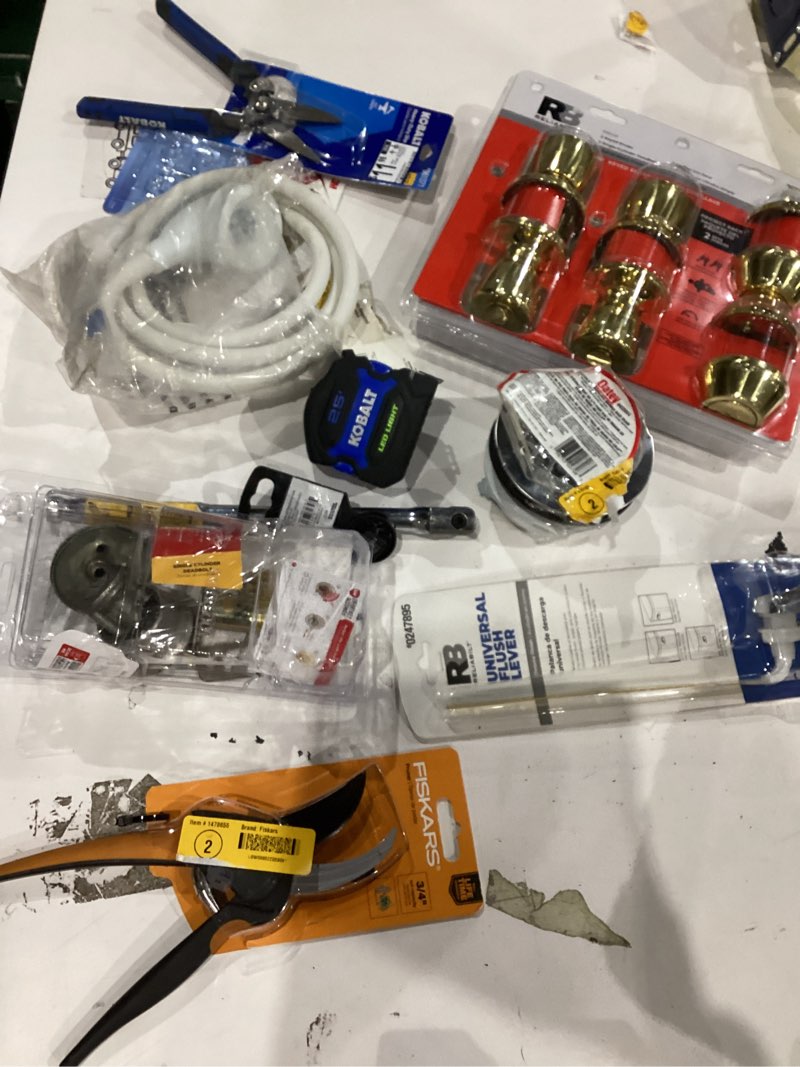 Condition photo showing As Is for assorted home improvement lot (small tools, screw, home accessories, etc.)