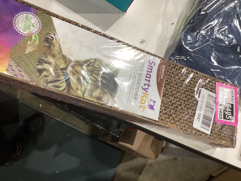 Condition photo showing Good Condition for SmartyKat Super Scratcher Wide Corrugated Cat Scratcher for Cats & Kittens, Features Catnip Infusion Technology & Less Mess, Recycled Material, Brown Super Scratcher (Single Wide) 4-Pack