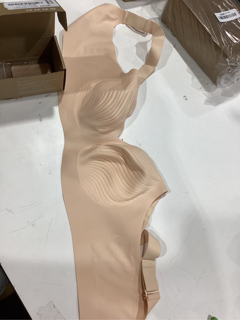 Condition photo showing New/Like New for comfelie one-piece seamless wireless t-shirt bra for women no wire full coverage underarm & back smoothing unpadded beige large