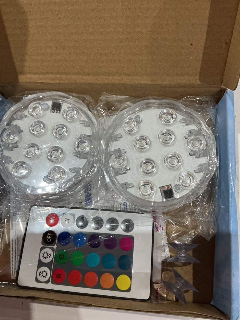 Condition photo showing Good Condition for yiamia hot tub lights - 2-pack rgb color battery-powered led pool lights with remote control and suction cup for ponds, decoration, parties, spas, aquariums 2 pack