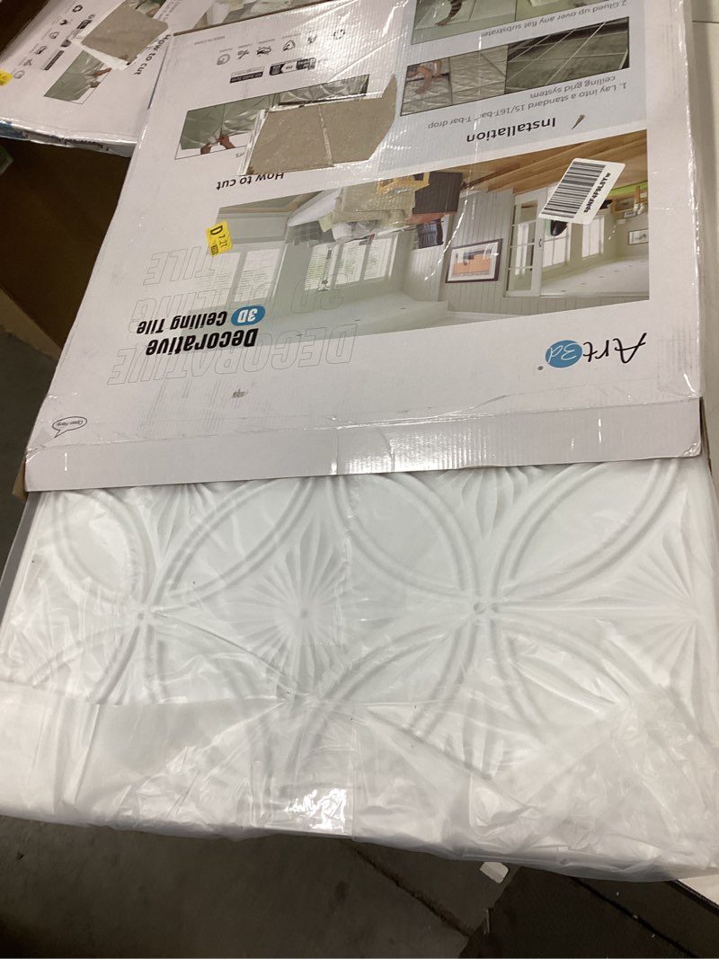 Condition photo showing item condition for Art3d Decorative PVC Drop Ceiling Tile 2ft x 2ft in White,Glue up Ceiling Panel 24 x 24in.12pcs
