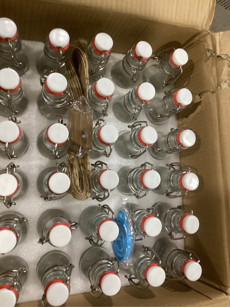 Condition photo showing Good Condition for 60 Pack Mini Swing Top Glass Bottles, 2 oz Mini Storage Bottles with Personalized Label Tags and String for Crafts, Decoration, Wedding Party (60)