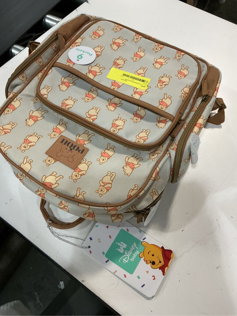 Condition photo showing Good Condition for disney winnie the pooh backpack diaper bag with all over print