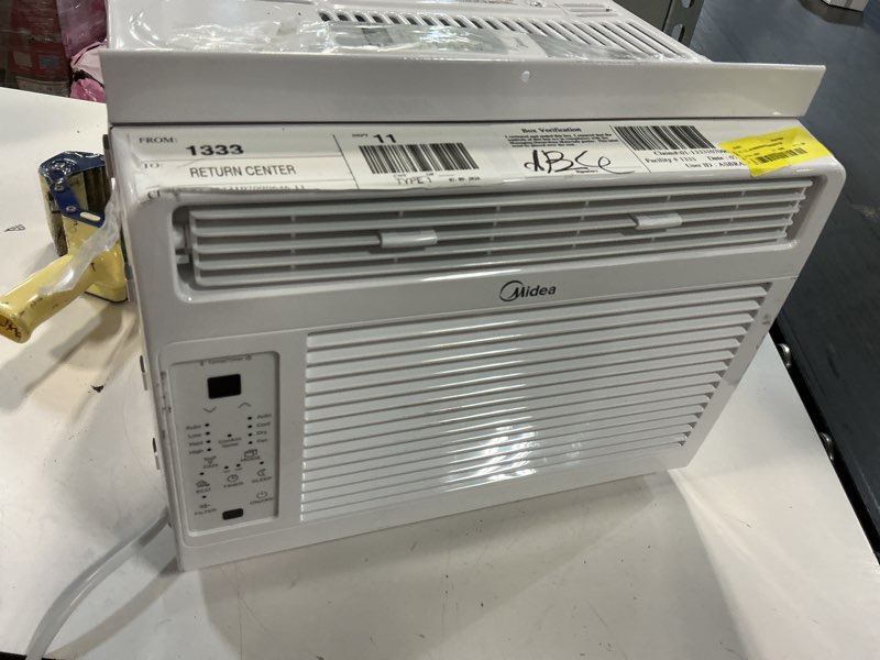 Condition photo showing As Is for midea 5,000 btu window air conditioner with remote and timer, cools up to 150 sq ft, white
