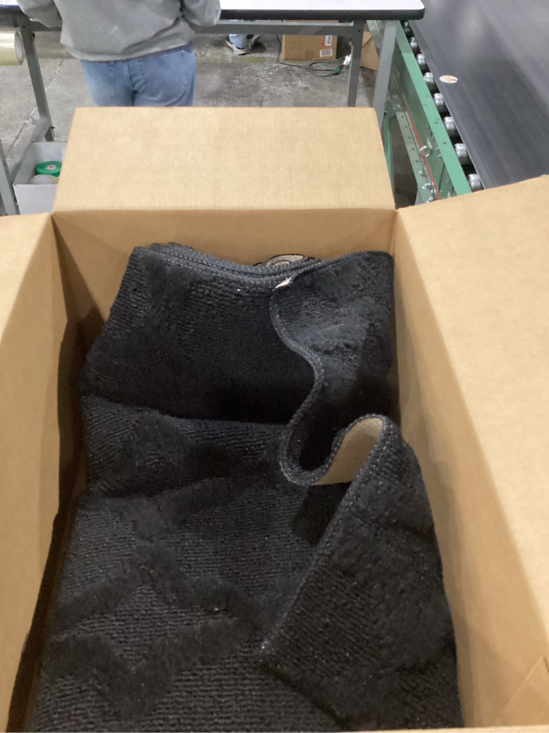 Condition photo showing As Is for Garland Rug Sparta Non Slip Polypropylene 2 Ft. X 8 Ft. Black Area Rug- Ideal for Living Rooms & Hallways, Stylish & Durable for High-Traffic Areas Black 2' x 8' (Rectangular)