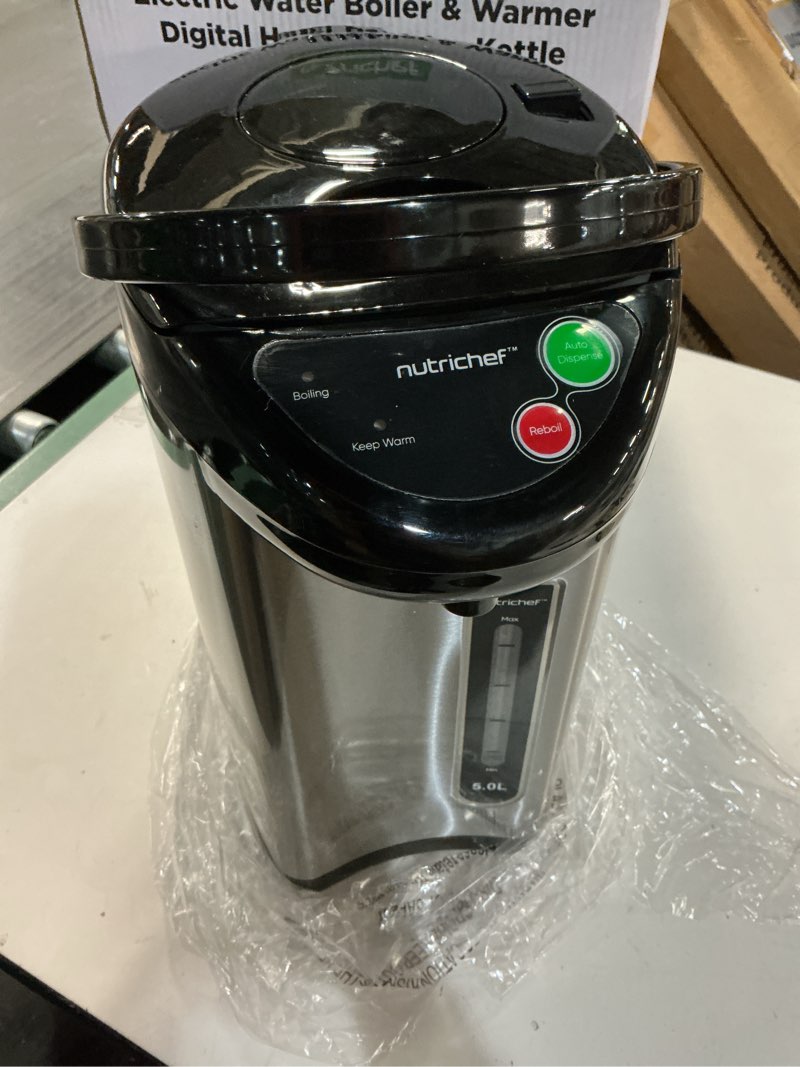 Condition photo showing As Is for nutrichef 5.2 qt electric water kettle, portable, quick heating, 5 liter digital kettle with 5 temperature settings, safety lock, stainless steel, 3 dispensing options, 8.46" x 11.2" x 16.5" 5.3 quarts