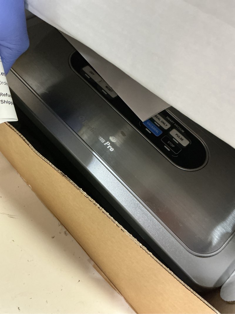 Condition photo showing As Is for Vacuum Sealer Machine with AirLock ProSeal System, 10-in-1 Vacuum Sealer for Food, Dry & Moist Modes, Compact Design with Digital Timer, Built-in Cutter & Roll Storage, Stainless Steel