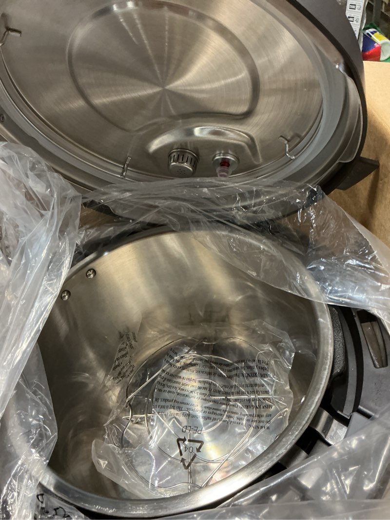 Condition photo showing As Is for instant pot pro (8 qt) 10-in-1 pressure cooker, slow cooker, rice/grain cooker, steamer, sauté, sous vide, yogurt maker, sterilizer, and warmer, includes app with over 800 recipes, black 8 quarts