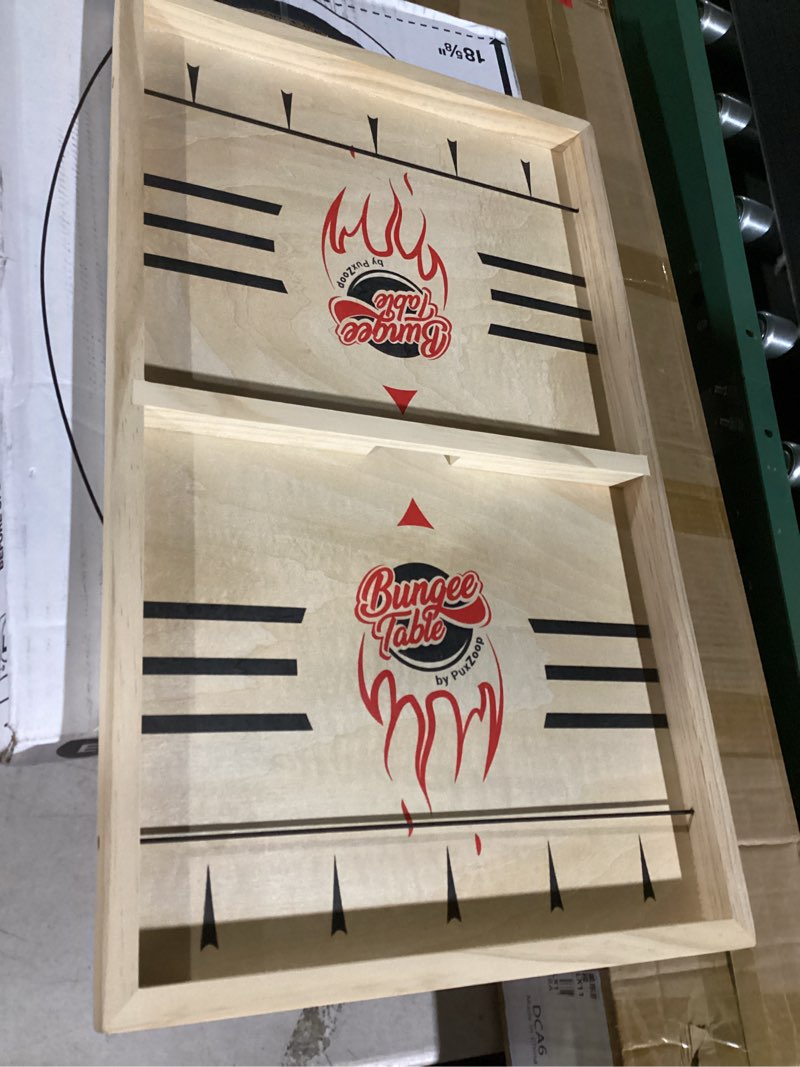 Condition photo showing Good Condition for Fast Sling Puck Game - Test Your Speed and Accuracy with This Fast-Paced Wooden Air Hockey Board Game - Guaranteed Fun for Family Night or Friends Party Extra Large