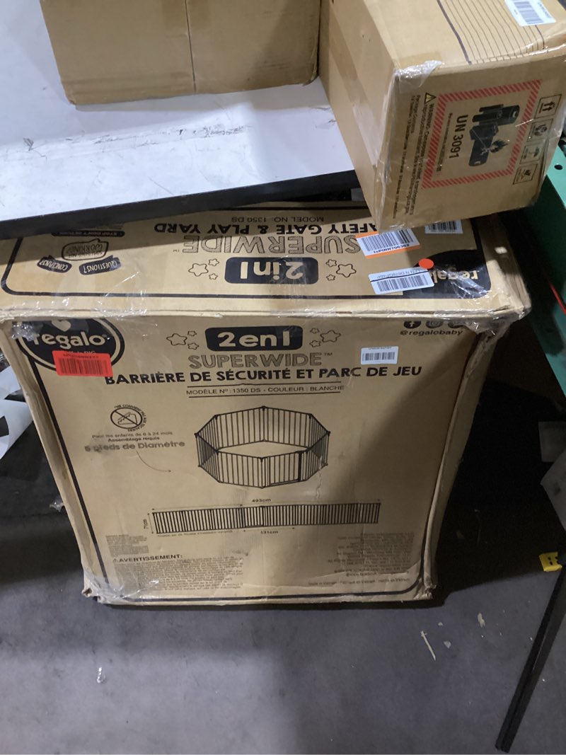 Condition photo showing New/Like New for regalo safety 192" super wide baby gate & play yard, 2-in-1 convertible extra wide safety barrier, hardware mounted for toddlers & pets, tested & safe for 30 years, american designed & owned, white 50.5-192"w x 28"h white