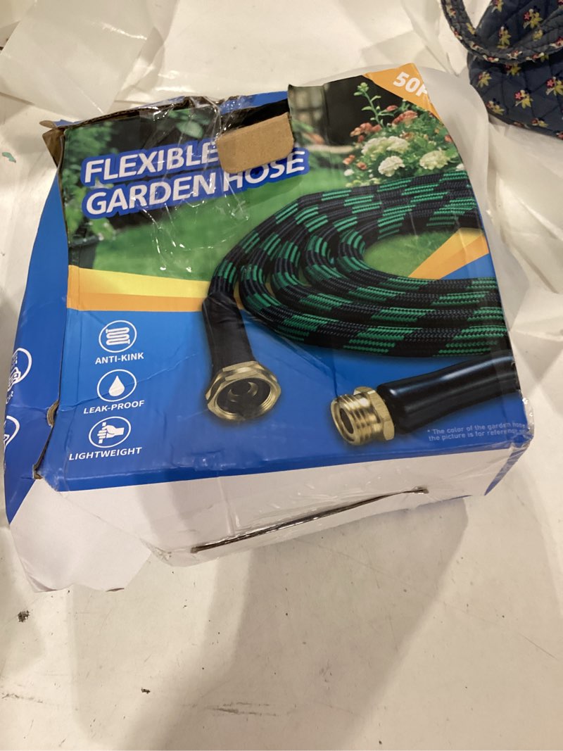 Condition photo showing Good Condition for expandable garden hose 50 ft with 10 function spray nozzle, flexible, kink free, leak-proof, ultra l