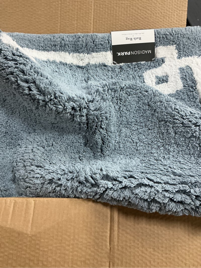 Condition photo showing Good Condition for Madison Park Evan Cotton Tufted Bath Rug 20x30 20x30
