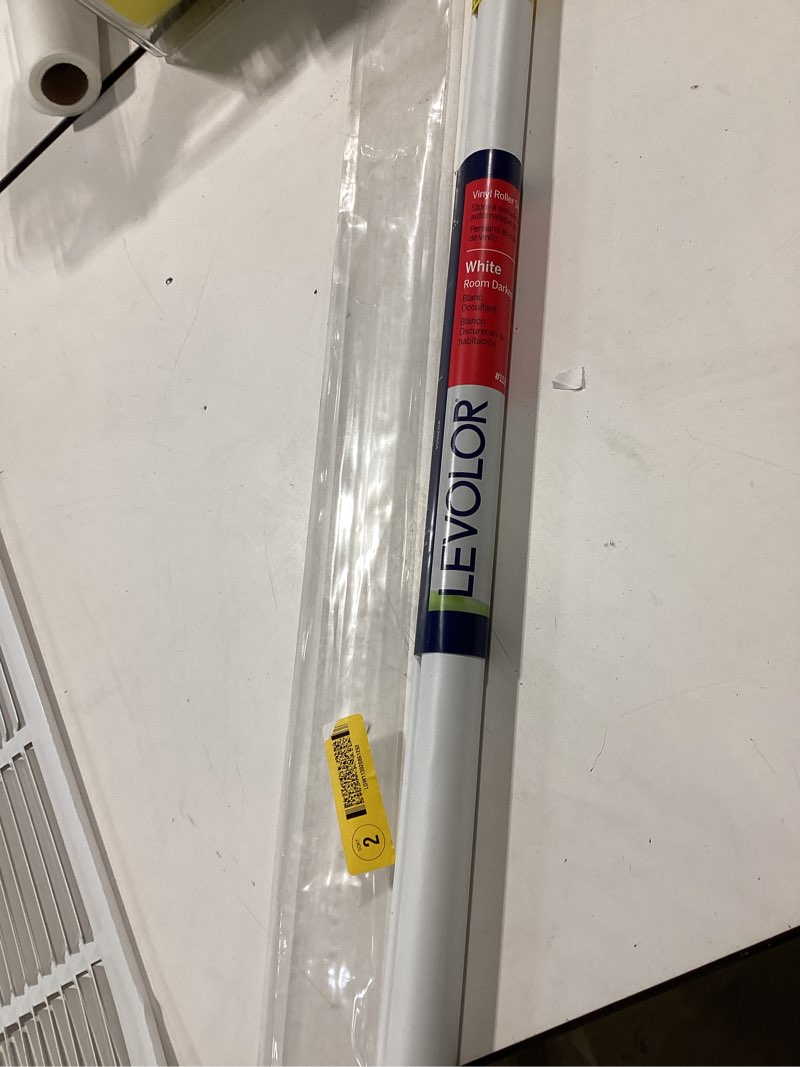 Condition photo showing Good Condition for 37" x 78" white room darkening cordless vinyl roller window shade