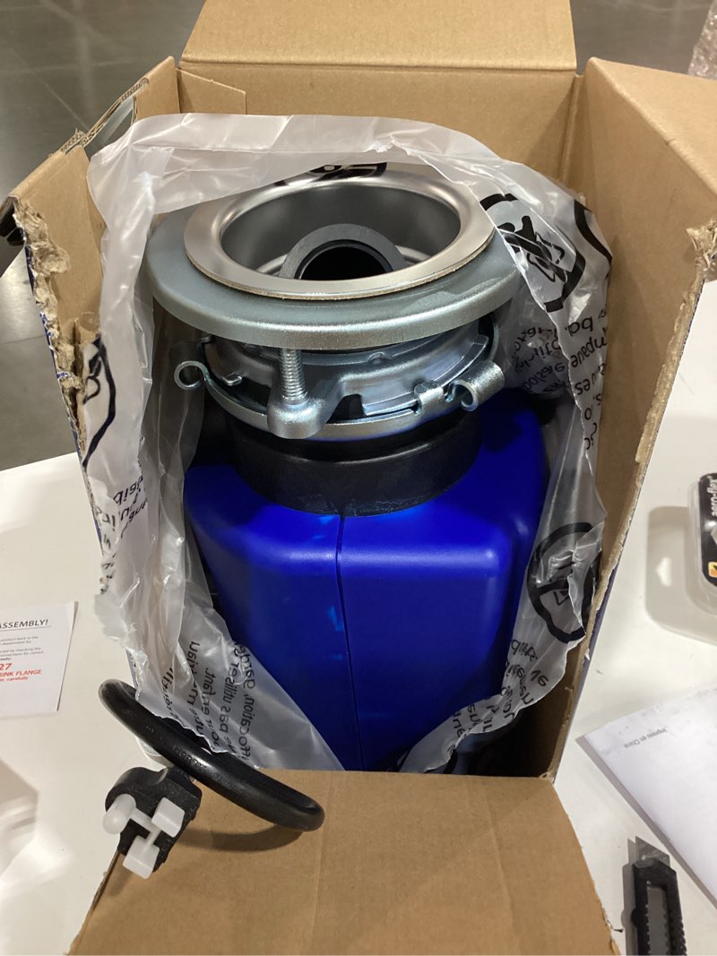 Condition photo showing As Is for project source continuous feed 1/2-hp septic safe corded garbage disposal with noise insulation