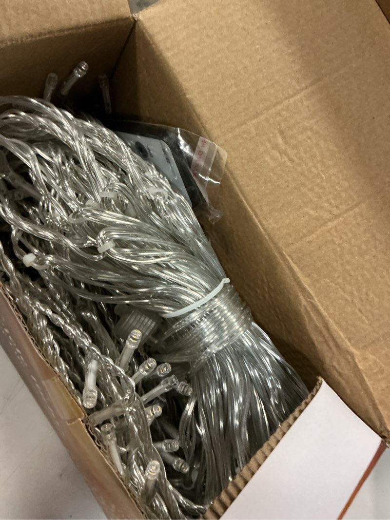 Condition photo showing Good Condition for JMEXSUSS 38.8FT Icicle Lights for Outside, 400 LED Icicle Christmas Lights Outdoor Indoor Plug in, Warm White String Lights for Christmas House Patio Party Fireplace Holiday Decorations Warm White 38.8FT