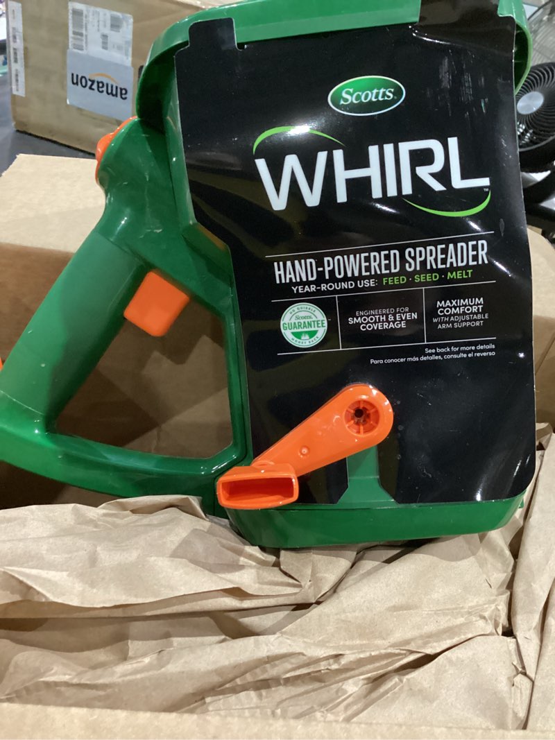 Condition photo showing New/Like New for whirl hand-powered spreader holds up to 1,500 sq.ft., handheld spreader for seed, fertilizer, salt and ice melt