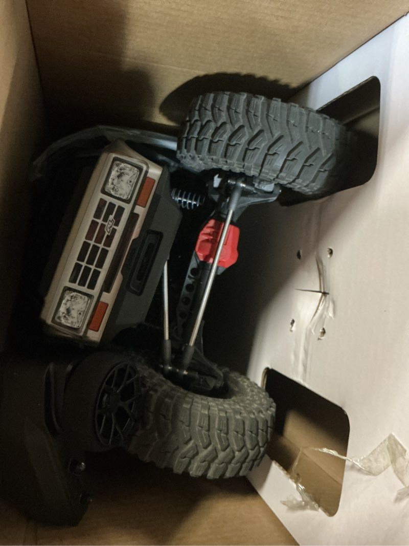 Condition photo showing As Is for axial rc truck 1/10 scx10 iii coyote 4x4 rtr (battery and charger not included) brushed rock crawler, silver, axi-2036t1