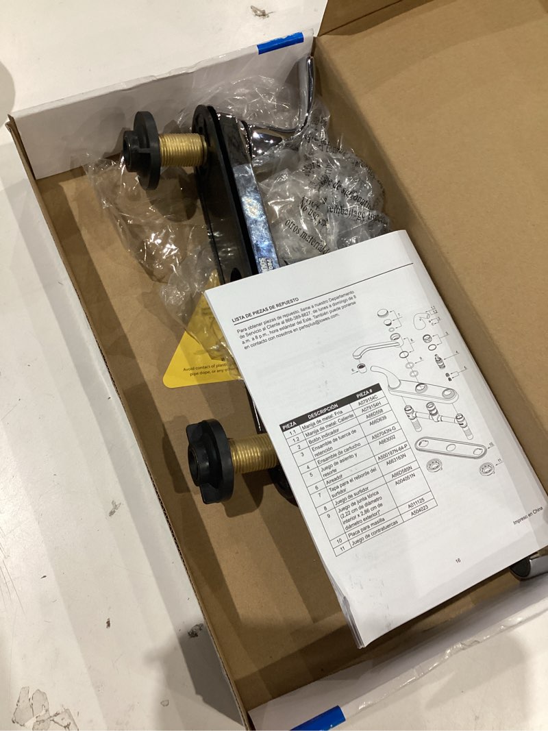 Condition photo showing As Is for project source dover chrome double handle kitchen faucet (deck plate included)