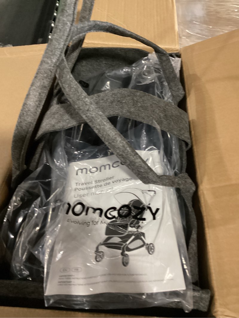Condition photo showing Good Condition for momcozy tuckgo lightweight travel stroller for toddlers 6 months to 3 years, compact fold for easier air travel, travel bag included, 3-position recline, upf 50+ canopy, 5-point harness, black
