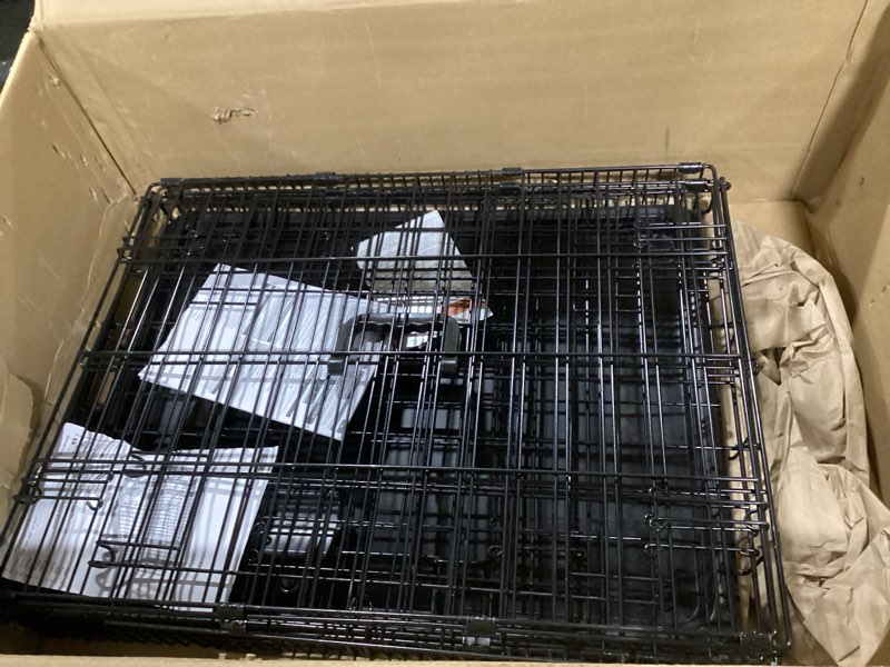 Condition photo showing Good Condition for Amazon Basics Durable, Foldable Metal Wire Small Dog Crate with Tray, Single Door, 24 x 18 x 20 in, Black 24 x 18 x 20 in Single Door w/ Divider