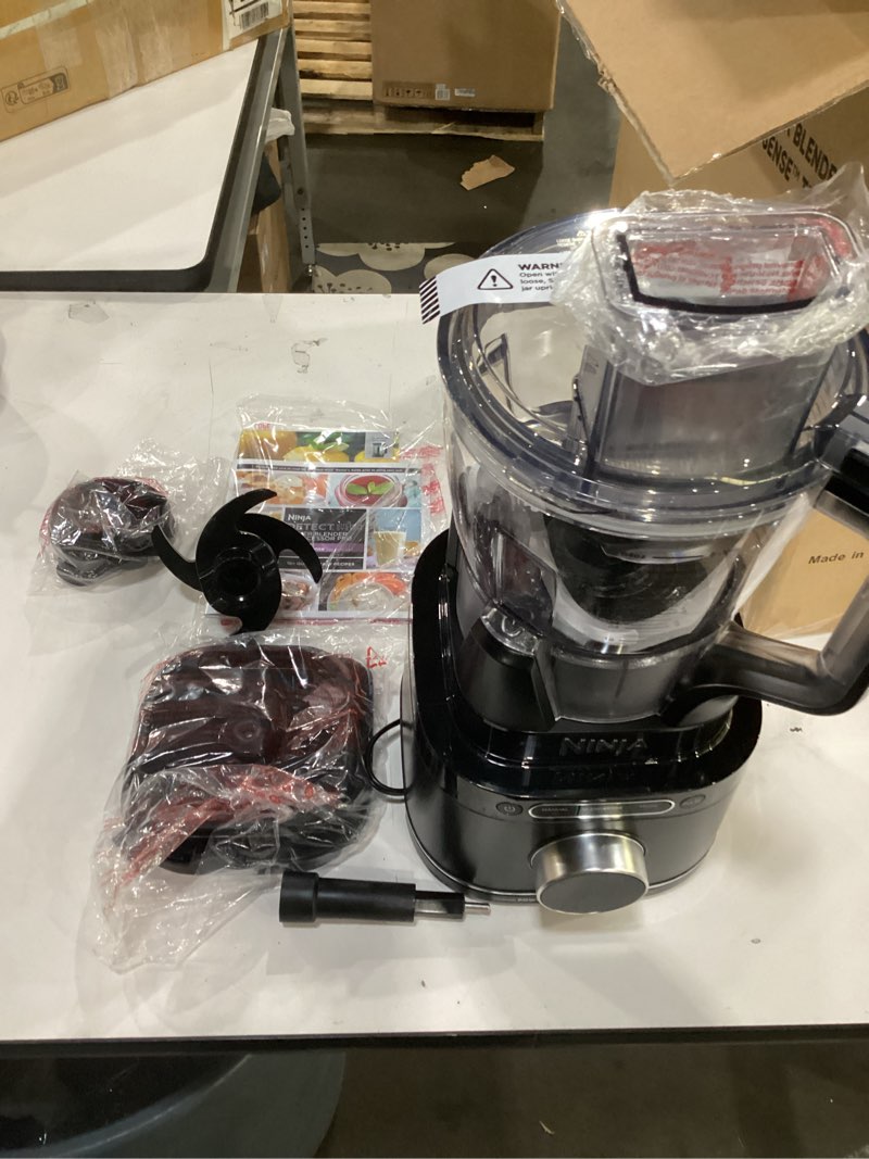 Condition photo showing As Is for not tested**** ninja kitchen system | all-in-one food processor & blender | with 8-cup bowl & (1) 24 oz. to-go cup | for smoothies, cookie dough, salsas, cole slaw & more | 1800 watt | black | tb401 blender + bowl + (1) 24-oz. cup