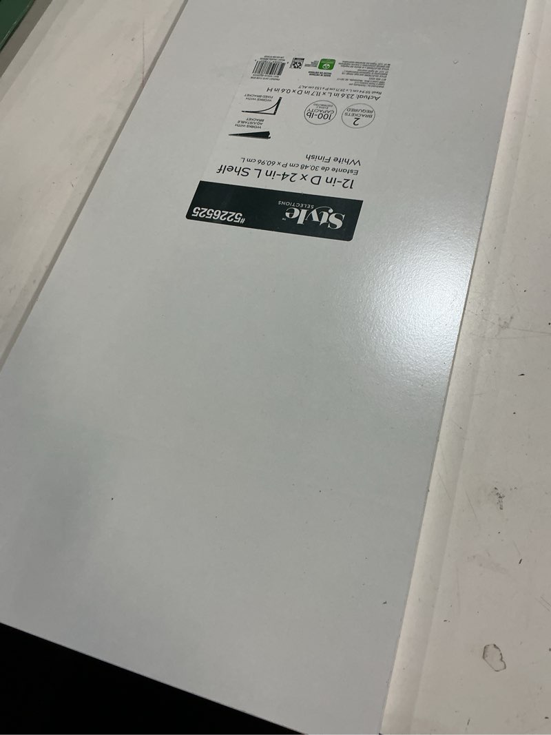 Condition photo showing As Is for Style Selections 11.7-in D x 23.6-in L White MDF Rectangular Shelf board