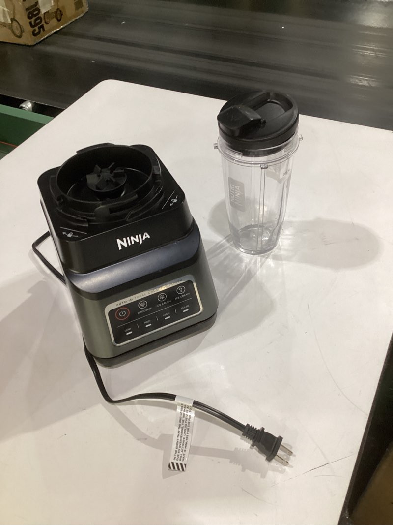 Condition photo showing As Is for (incomplete parts, not tested)ninja professional plus blender | max power smoothie blender, ice cream maker, frozen drink mixer & margarita machine | 3 auto iq™ presets, 1400 w, 72oz total crushing pitcher | dark grey, bn701 72 oz. blender + total crushing pitcher
