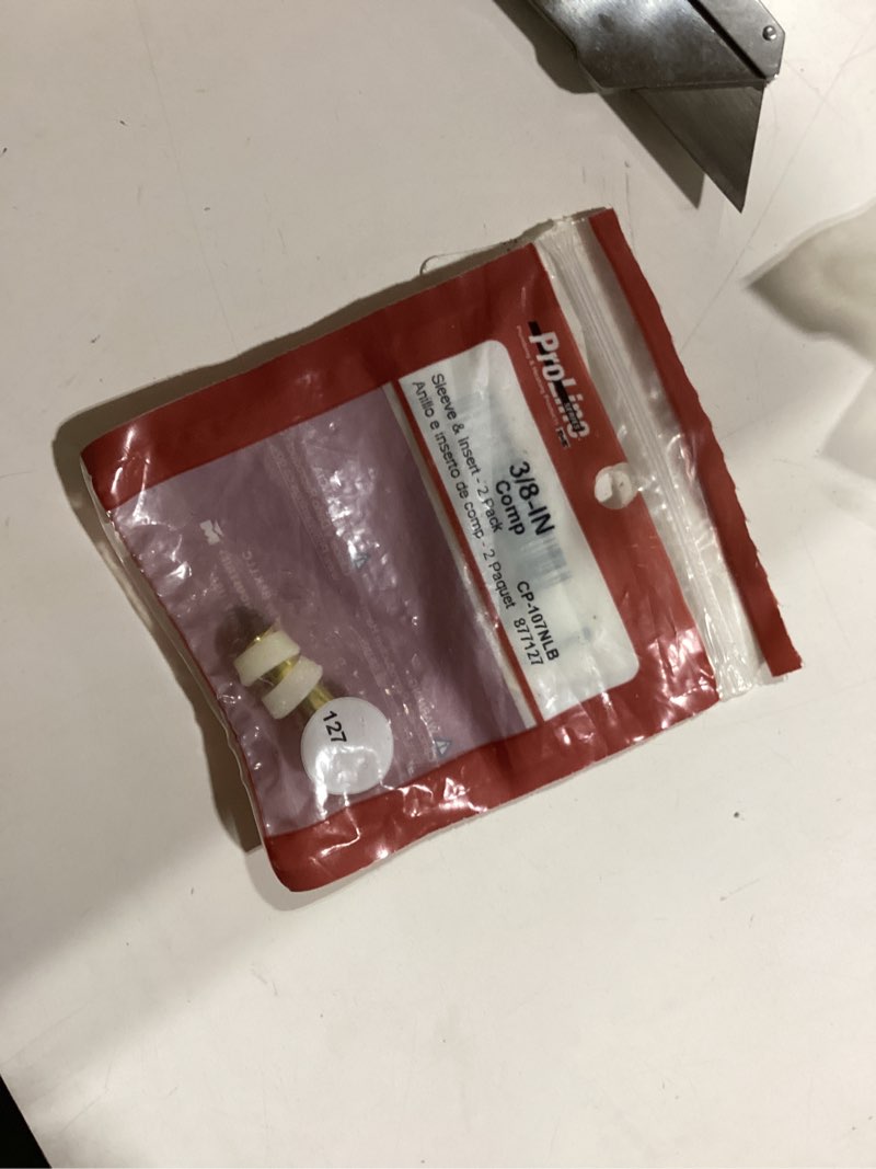 Condition photo showing As Is for proline series 2 -pack brass 3/8-in female cap fitting incomplete