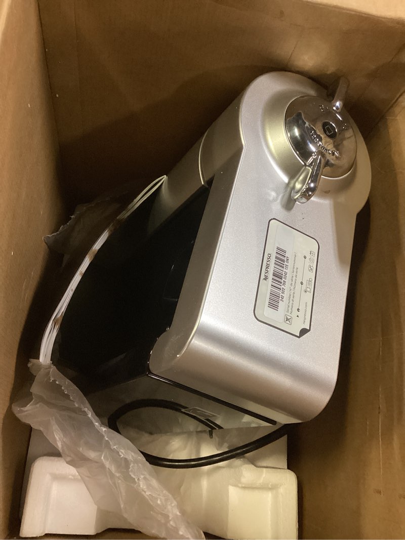 Condition photo showing As Is for nespresso vertuo coffee and espresso machine by de'longhi, 1597 milliliters, silver