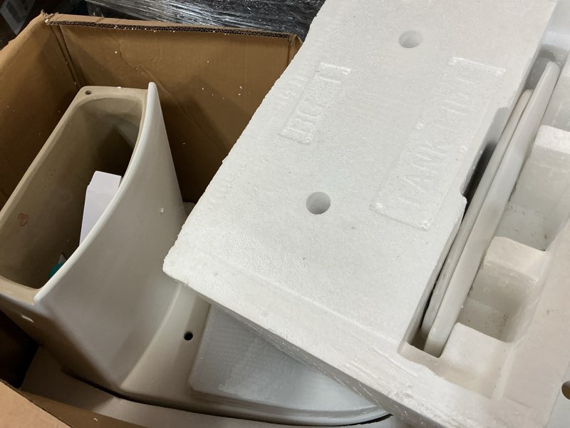 Condition photo showing New/Like New for st. tropez 1-piece 1.28 gpf single flush elongated toilet in white glossy