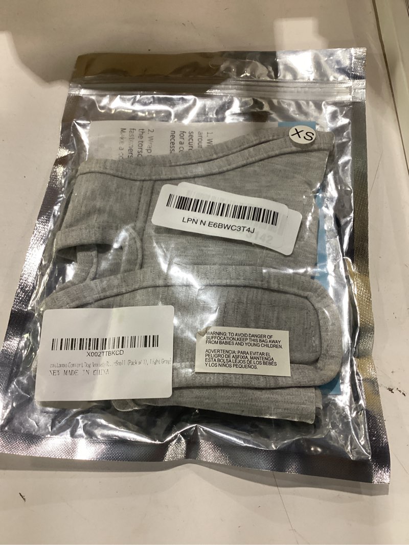 Condition photo showing New/Like New for comfort dog anxiety relief coat, dog anxiety calming vest wrap for thunderstorm,travel,4th of july fireworks,vet visits,separation anxiety relief for dogs (x-small (pack of 1), light gray) light grey x-small
