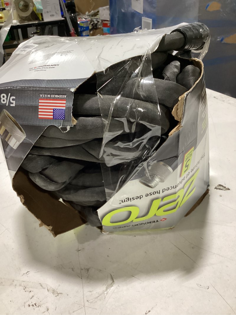 Condition photo showing As Is for zero-g 4001-100 garden hose, 5/8" x 100', gray zero-g 5/8" x 100'