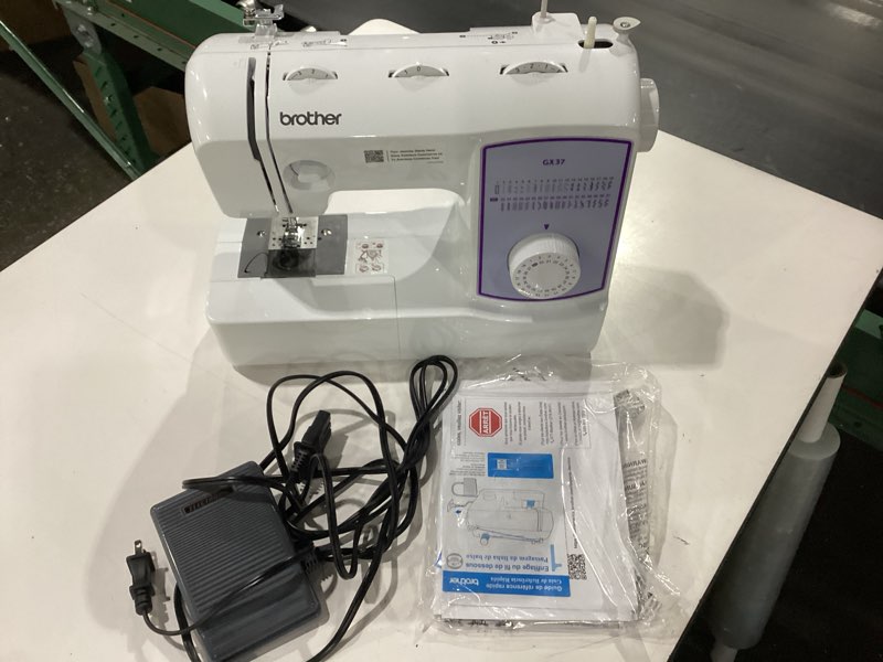 Condition photo showing New/Like New for brother sewing machine, gx37, 37 built-in stitches, 6 included sewing feet